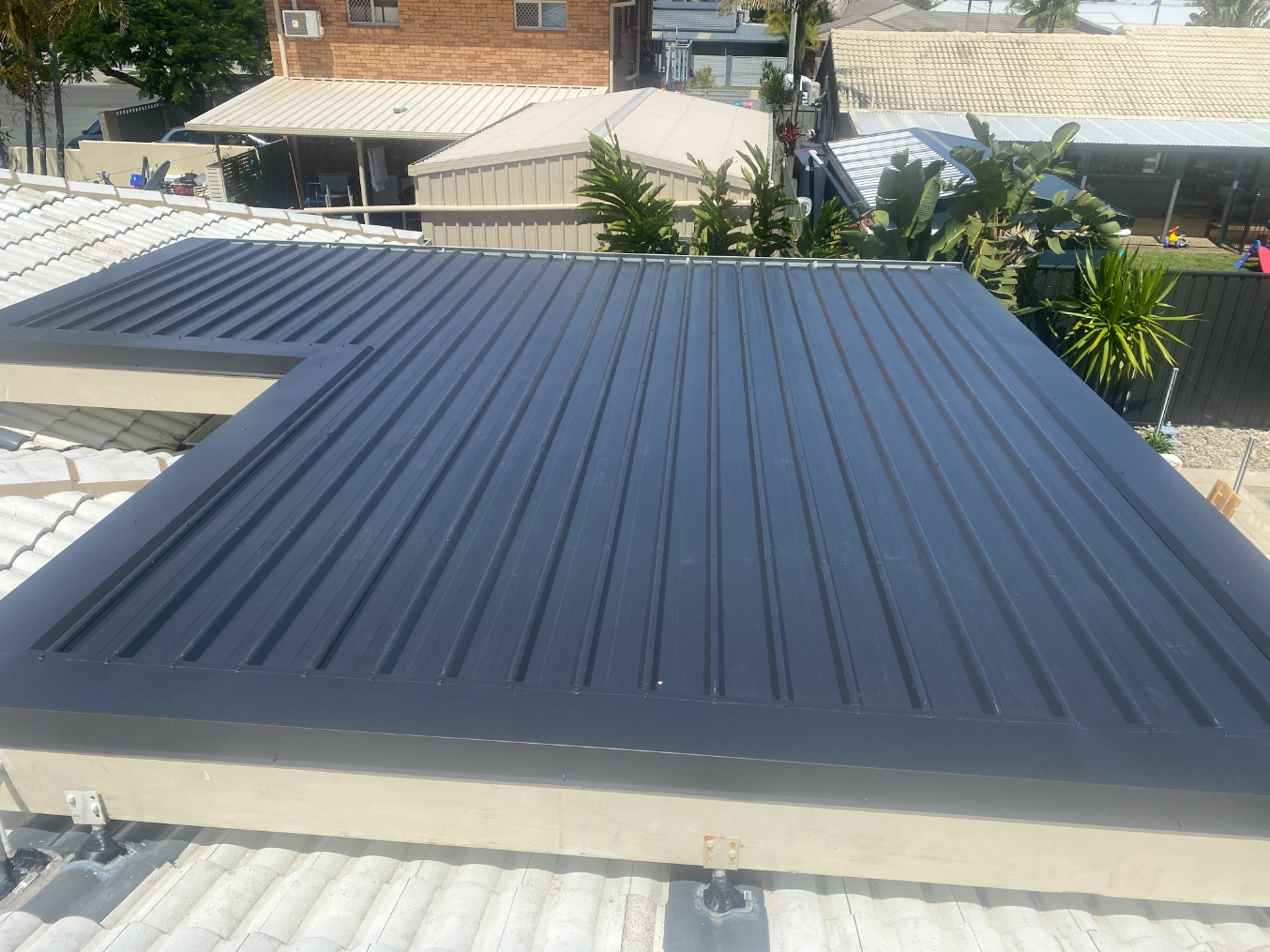 new dark colorbond metal roof finished