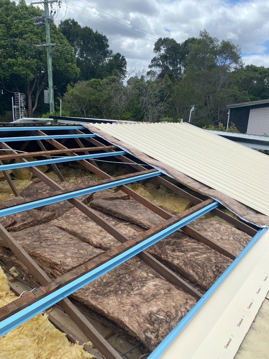 roof insulation and structural framing replacement